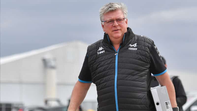 Otmar Szafnauer with files under his arm at the 2023 British Grand Prix