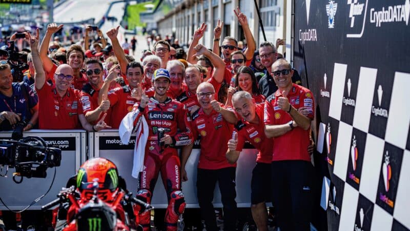 Pecco Bagnaia celebrates with Gigi Dall Igna and Ducati crew at 2023 MotoGP Austrian GP