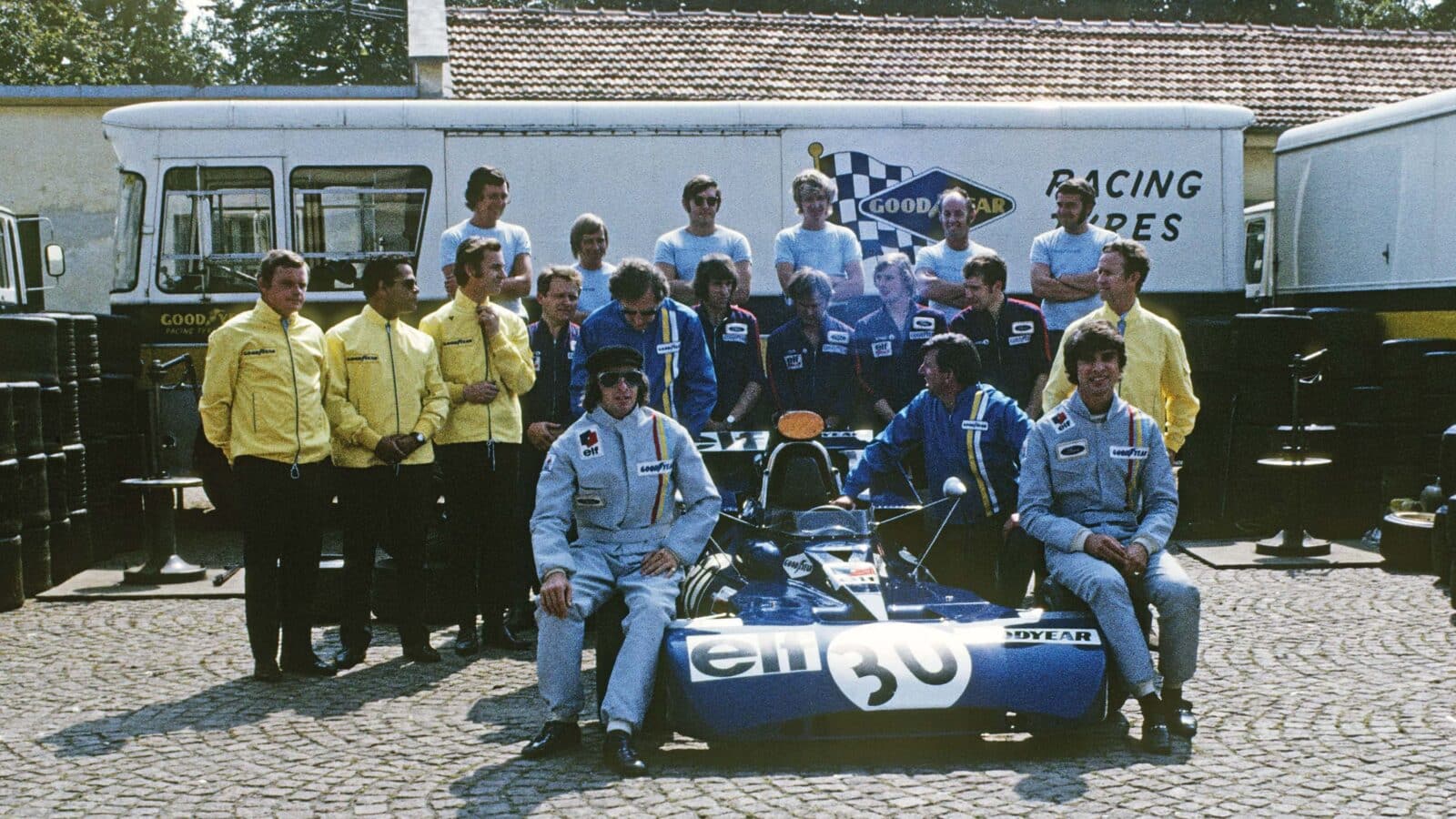 Tyrrell team photo at the Italian GP at Monza in 1971, with Stewart and Cevert