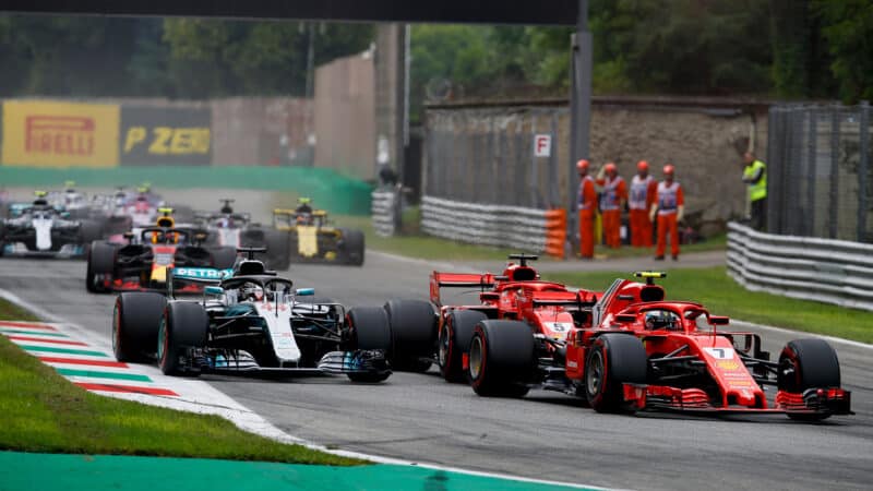 Kimi Raikkonen slows down ahead of Kimi Raikkonen and Lewis Hamilton in 2018 Italian Grand Prix