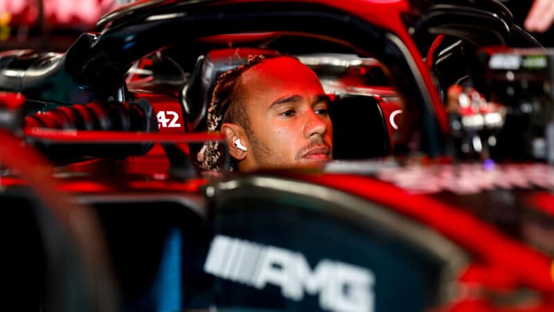 Lewis-Hamilton-sits-in-cockpit-of-2023-Mercedes-F1-car-ahead-of-Japanese-Grand-Prix