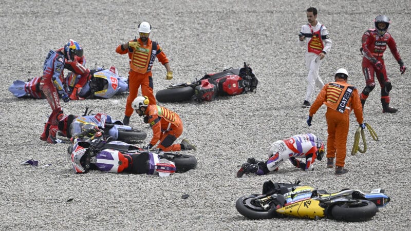 Marshals help MotoGP riders after 2023 Catalan GP crash