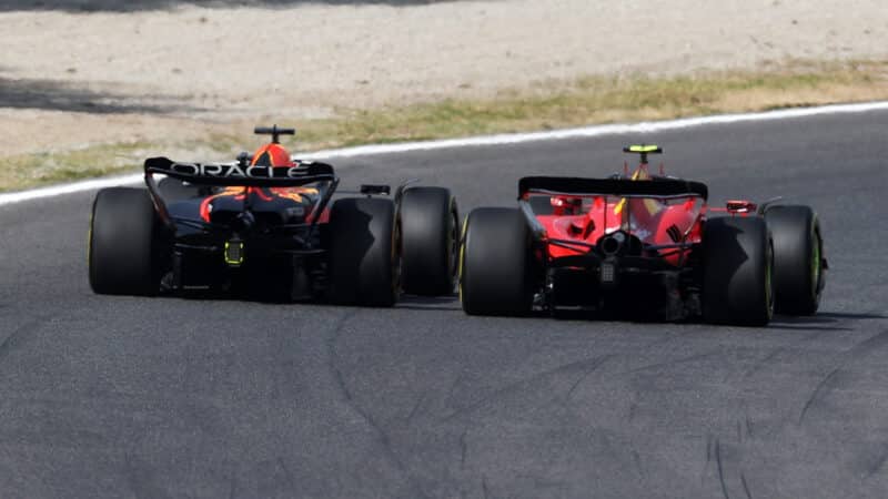 Max Verstappen side by side with Calos Sainz as he overtakes in the 2023 F1 Italian Grand Prix