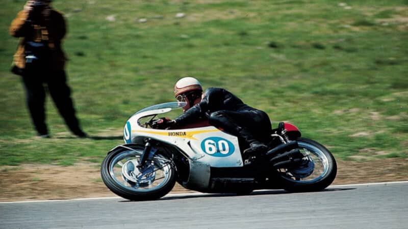 Mike Hailwood on Honda 250 motorbike