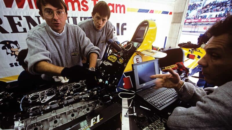 The technical team servicing the Renault engine