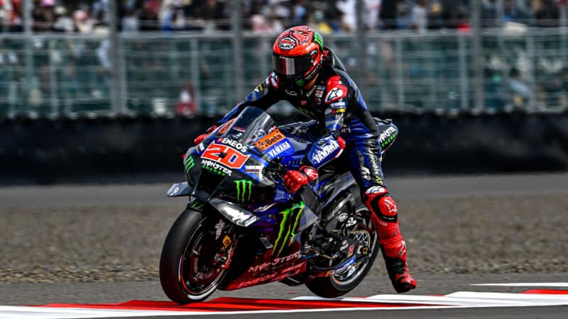 Fabio Quartararo bounces over kerbs at Mandalika in 2023 MotoGP Indonesian GP