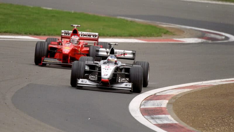 Ferrari of Michael Schumacher chases McLaren of Mika Hakkinen in 1998 Luxembourg GP at the Nurburgring