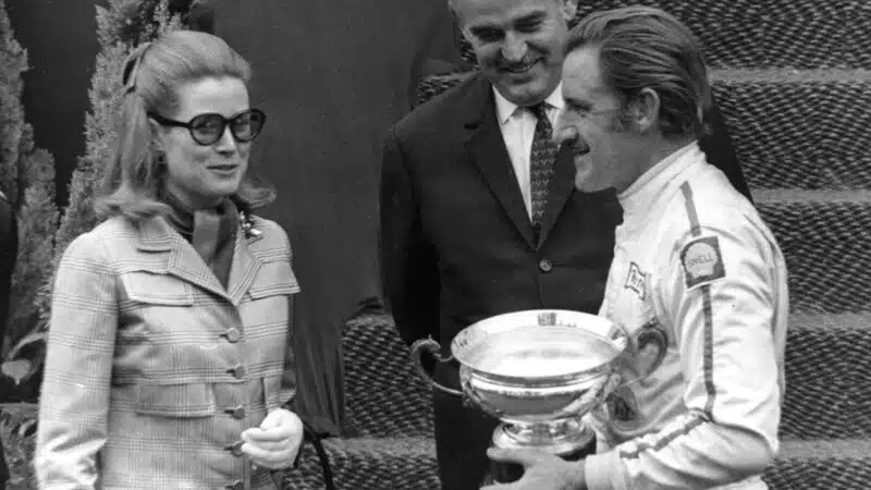 https://motorsportmagazine.b-cdn.net/wp-content/uploads/2023/10/Graham-Hill-with-Princess-Grace-and-Prince-Ranier-after-winning-1969-Monaco-Grand-Prix-800x450.jpg.webp