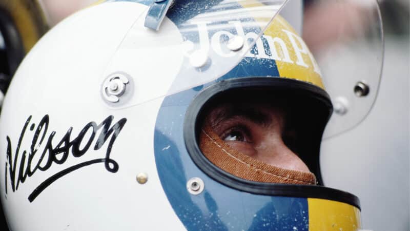 Gunnar Nilsson in yellow and blue striped helmet