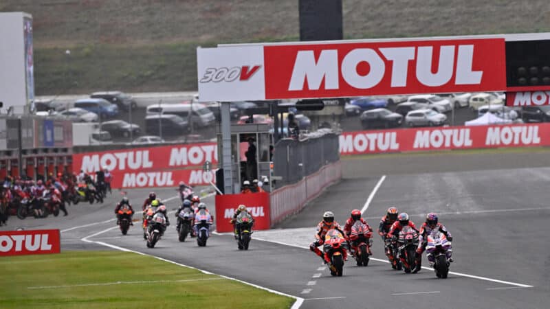 MotoGP bikes leave the Motegi pitlane at the 2023 Japanese Grand Prix