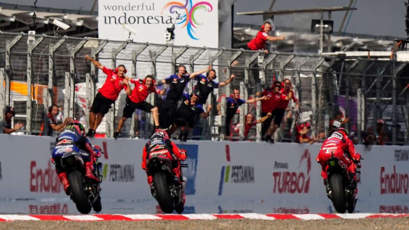 Pecco Bagnaia crosses the line at Mandalika to win 2023 MotoGP Indonesian GP