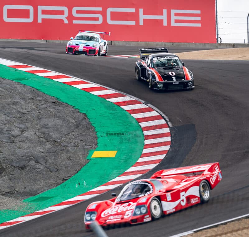 Racing Porsches on Laguna Seca corkscrew in 2023 Rennsport Reunion
