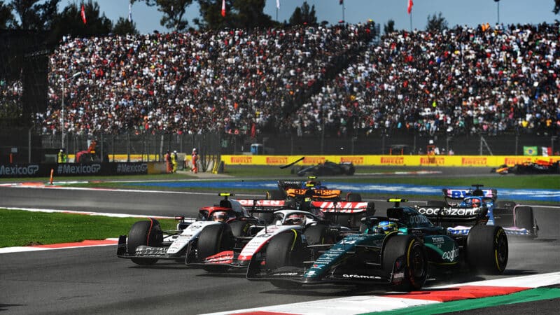 Fernando Alonso battles with Kevin Magnussen and Yuki Tsunoda in 2023 Mexico City Grand Prix