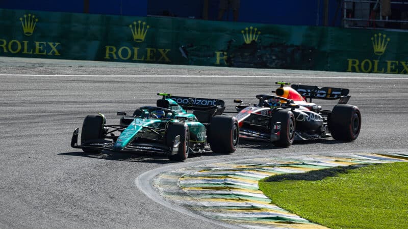 Fernando Alonso defends against Sergio Perez in 2023 Sao Paulo Grand Prix