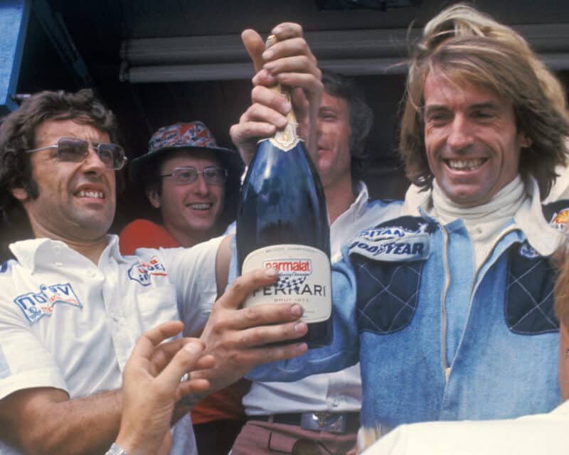 Laffite celebrates 1977 Swedish GP victory