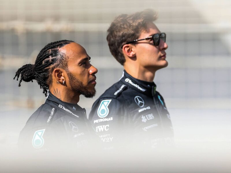 Lewis Hamilton and George Russell, stand side by side