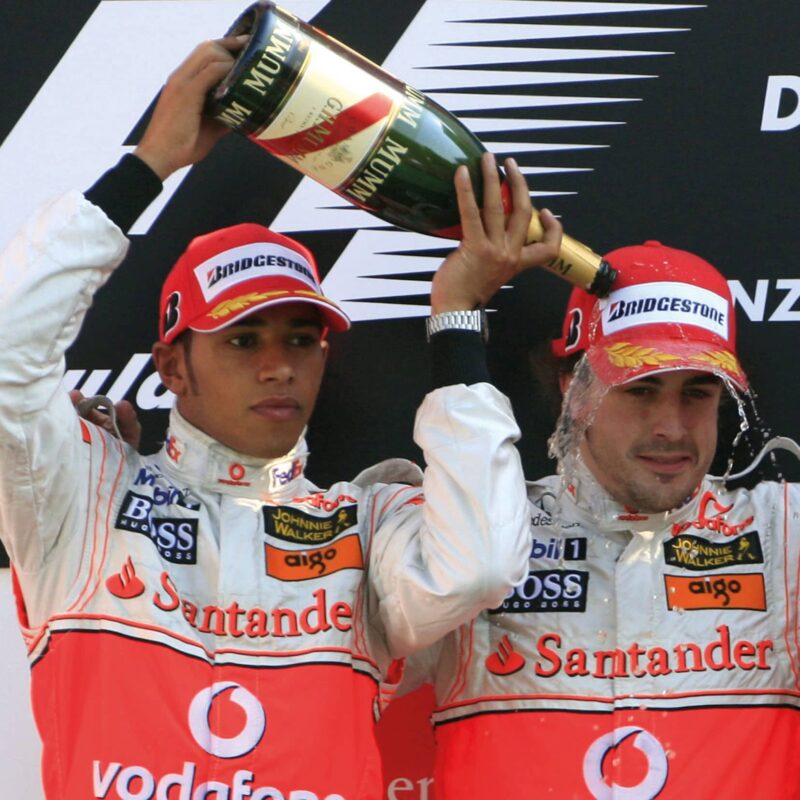 Lewis Hamilton pours drink on Fernando Alonso