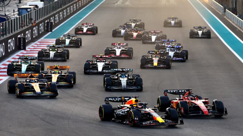 Max Verstappen leads Charles Leclerc at the start of the 2023 F1 Abu Dhabi GP