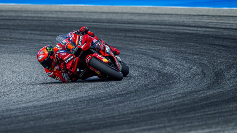 Pecco Bagnaia gets his elbow down while cornering