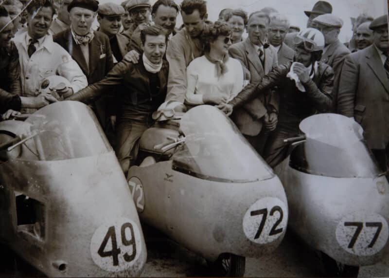 Bill Lomas with Bob McIntyre and Cecil Sandford at 1955 Junior TT