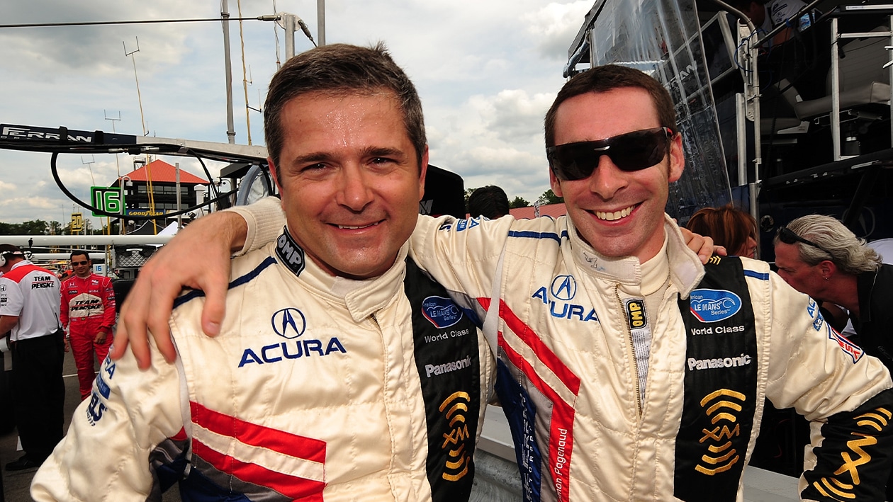 Gil de Ferran with Simon Pagenuad in ALMS pitlane