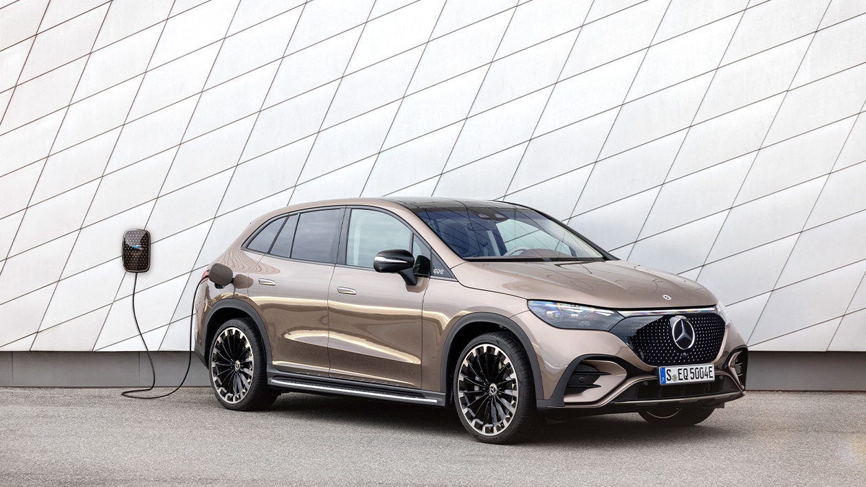 Mercedes EQE plugged in to electric car charger