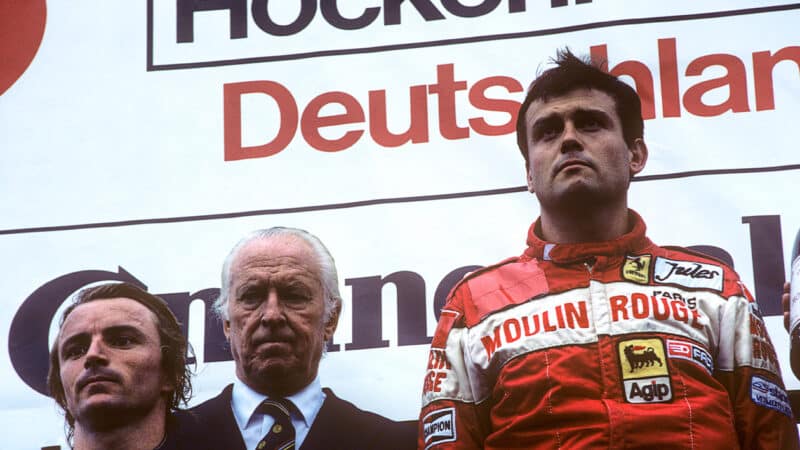 Patrick Tambay on the podium at the 1982 German Grand Prix