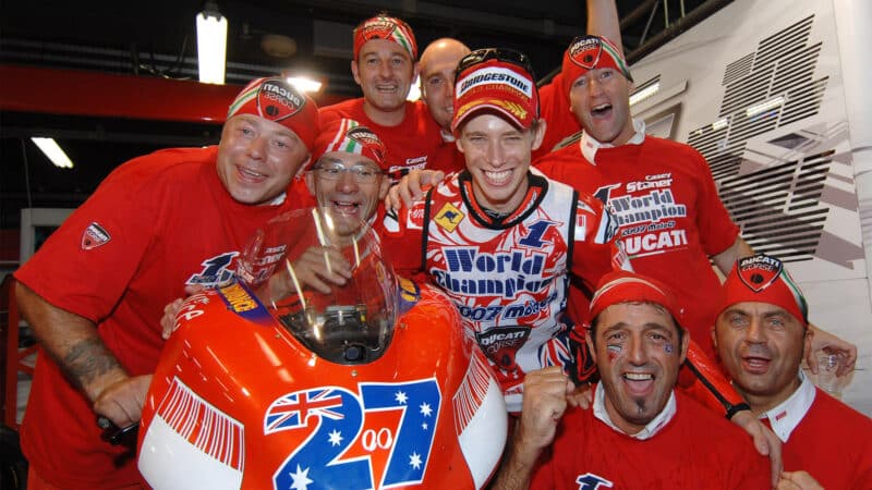 Gabbarini, on Stoner’s left, celebrates Ducati’s first title at Motegi in 2007