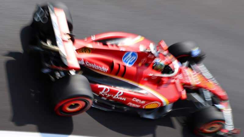 Blurred image of F1 Ferrari of Charles Leclerc at Monza in 2024