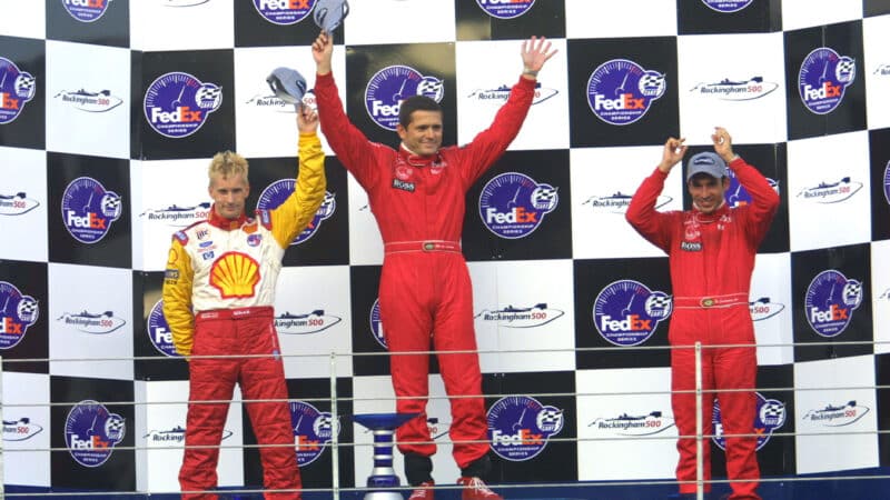 GIl de Ferran on Rockingham IndyCar podium in 2001 with Kenny Brack and Helio Castroneves