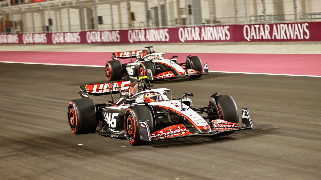 Haas F1 cars driving in formation at Qatar Grand Prix weekend