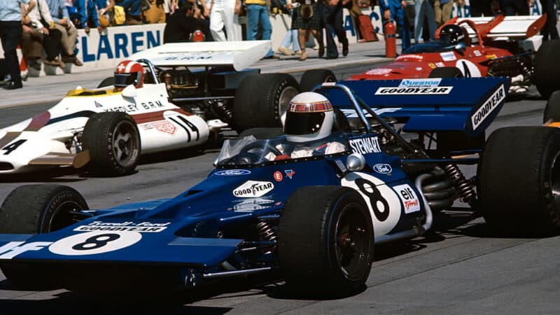 Jackie Stewart on grid with Jo Siffert and Jacky Ickx in 1971 F1 Questor GP