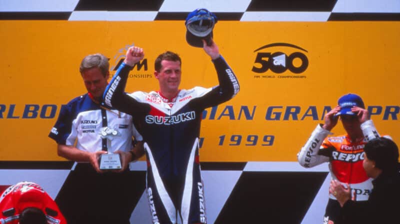 Kenny Roberts Junior celebrates on the podium after winning 2000 MotoGP championship