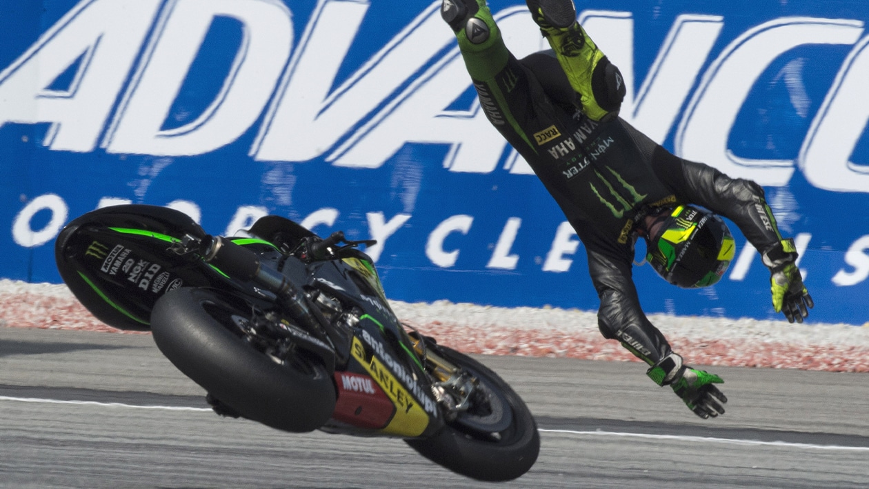 Pol Espargaro is flung off Yamaha M1 Moto GP bike