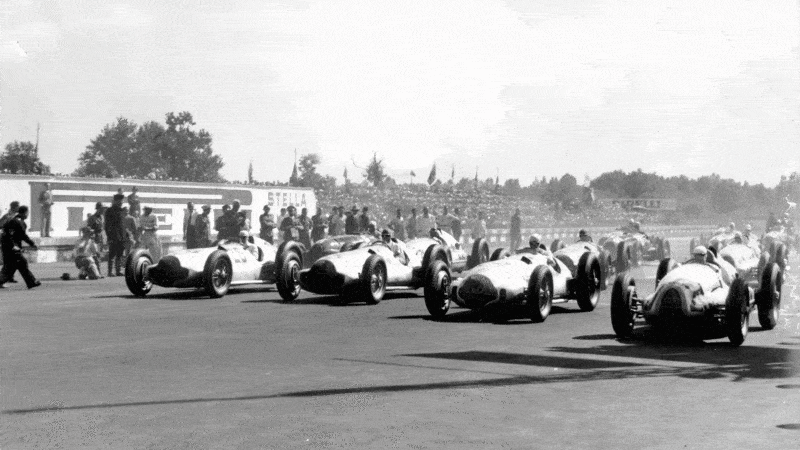 A trio of W154s on the  front row of the 1938  Italian Grand Prix, with Hermann Müller’s Auto Union on the right
