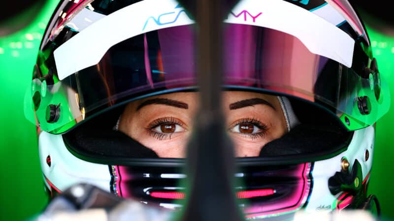 F1 Academy driver Carrie Schreiner looks out from her helmet ahead of Saudi Arabian GP weekend