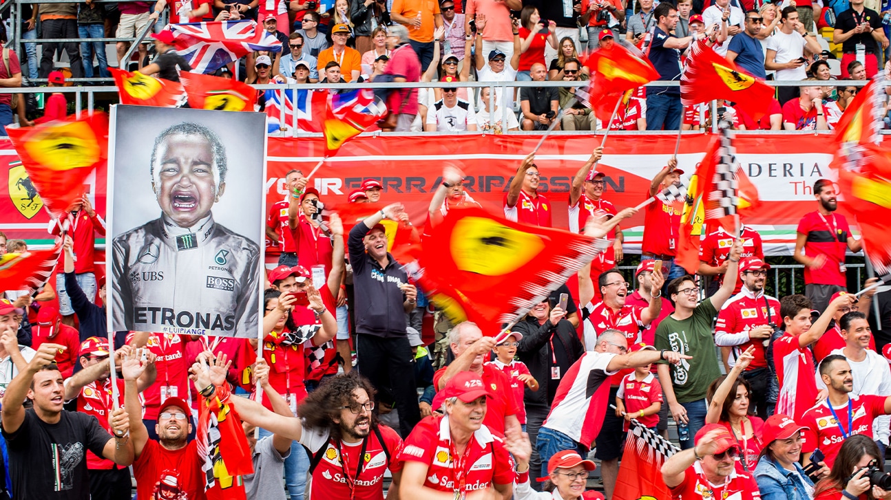 Ferrari fans at Monza wave banner of Lewis Hamilton as a baby
