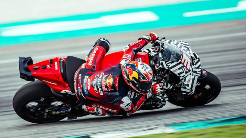 Pedro Acosta on part-camouflaged KTM MotoGP bike in 2024 preseason testing