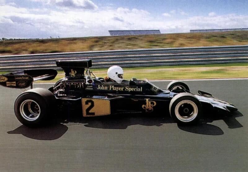 Side view of Lotus 72 Formula 1 car on track