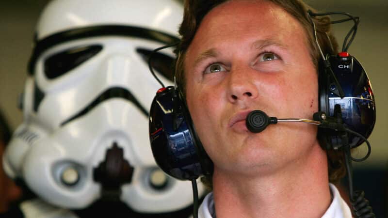 Star Wars stormtrooper behind Christian Horner in Red Bull pit garage