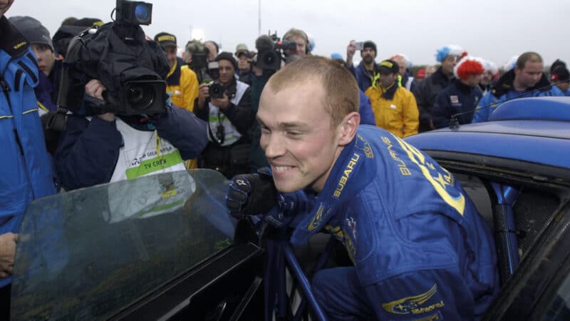 mobbed by the media at the finish