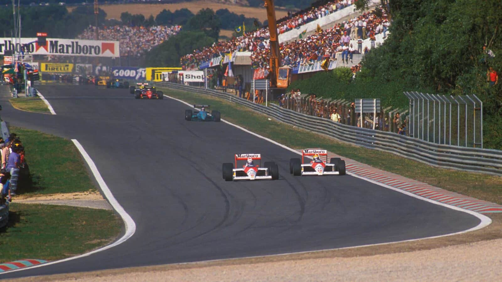 Ayrton Senna is passed by Alain Prost at Estoril in 1988