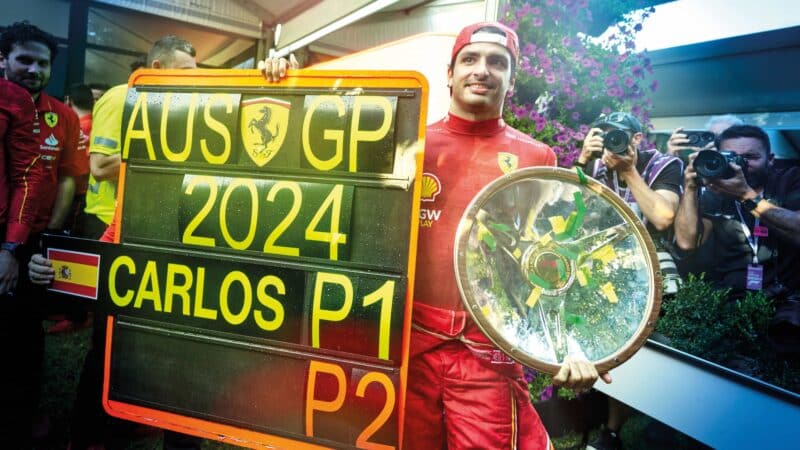 Carlos Sainz celebrates GP win