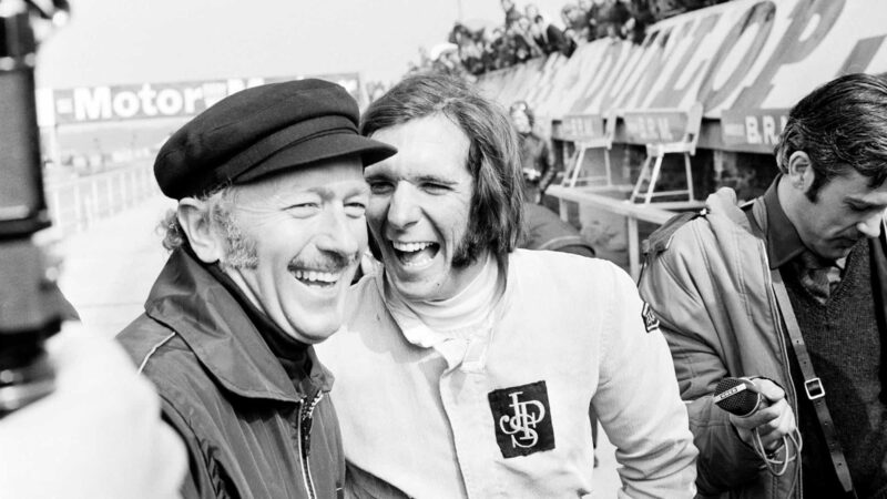 Chapman and Emerson Fittipaldi laughing