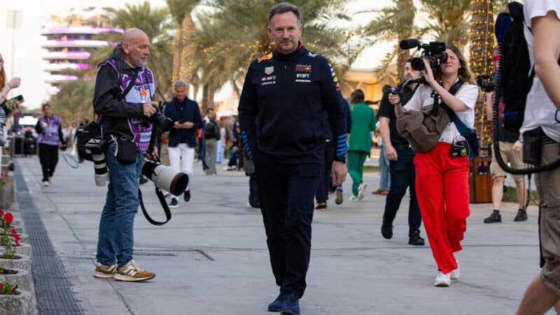 Christian Horner pursued by photographers ahead of the 2024 F1 Bahrain Grand Prix