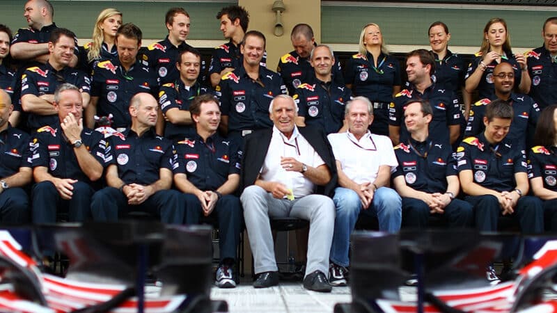 Dietrich Mateschitz sits between Christian Horner and Helmut Marko in Red Bull F1 team photograph