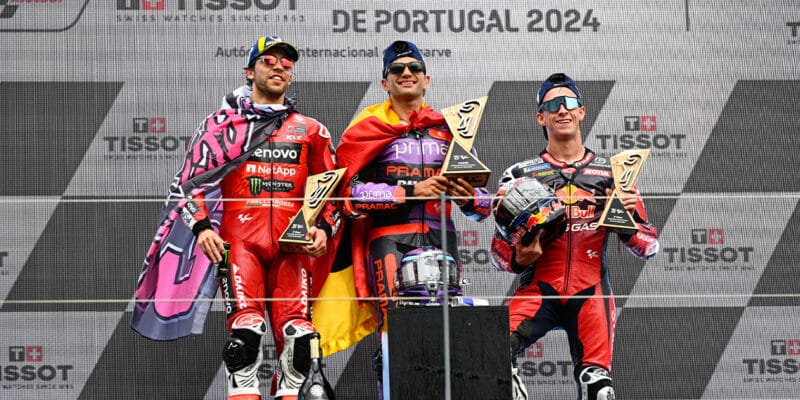 Enea Bastianini with Jorge Martin and Pedro Acosta on 2024 MotoGP Portuguese GP podium