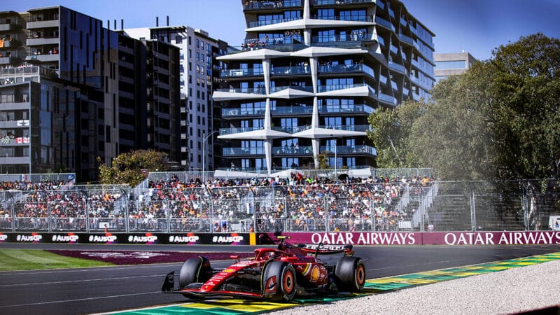 Ferrari of Carlos Sainz in front of apartment buildings at 2024 F1 Australian Grand Prix