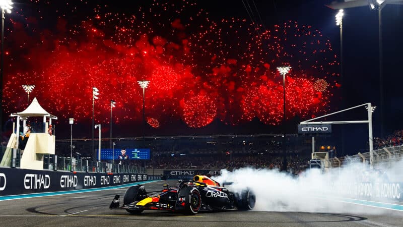 Fireworks and tyre smoke from Max Verstappen Red Bull after winning 2023 Abu Dhabi Grand Prix