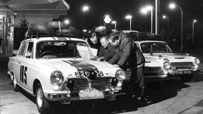 the John Willmet team check their maps the night before departure